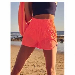 Free People movement Neon Orange Shorts